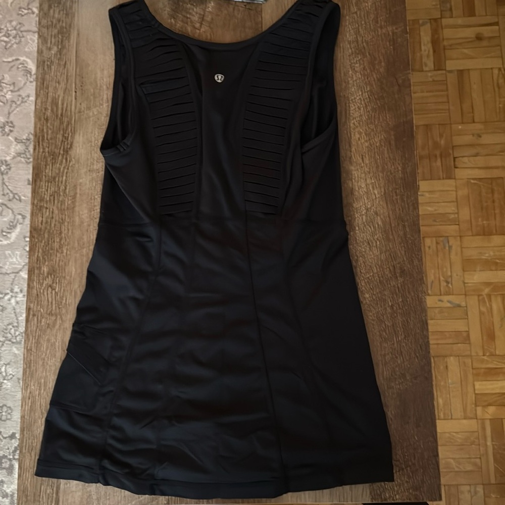 Black lululemon tank with no size tag. Approximately medium or size 6